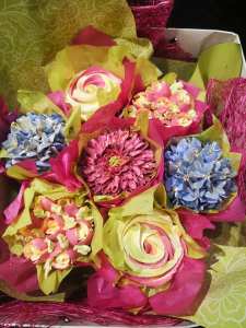 Special occasion floral cupcake bouquet for mother's day, set of individually decorated cupcakes each a different flower in shades of pink and blue -  by Embellished Food Art, Lower Hutt, Wellington cake decorator